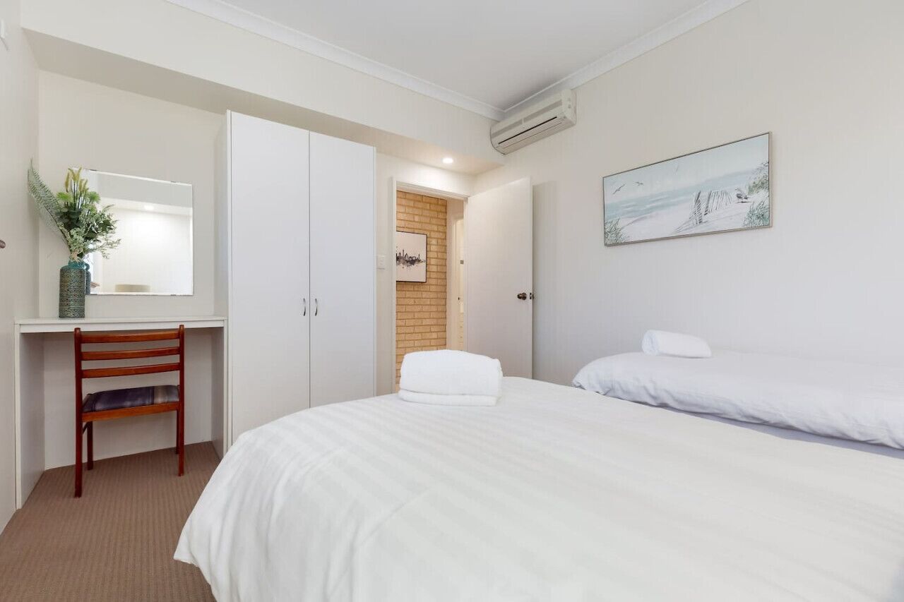 1 bedroom, desk, iron/ironing board, travel cot