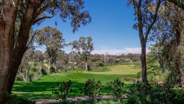 A golf course with a clear path, surrounded by trees and greenery. - A5 - Bright & spacious, 1 bathroom apartment! (Connolly)