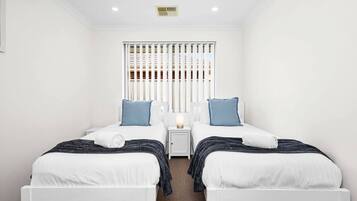 4 bedrooms, desk, iron/ironing board, travel cot