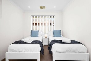 4 bedrooms, desk, iron/ironing board, travel cot