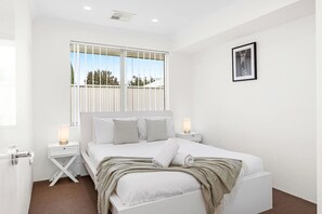 4 bedrooms, desk, iron/ironing board, travel cot