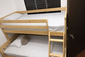 A bunk bed with two levels, a wooden ladder, and a door with a keyhole. - Room AREAS by QuBeLab (Bello)