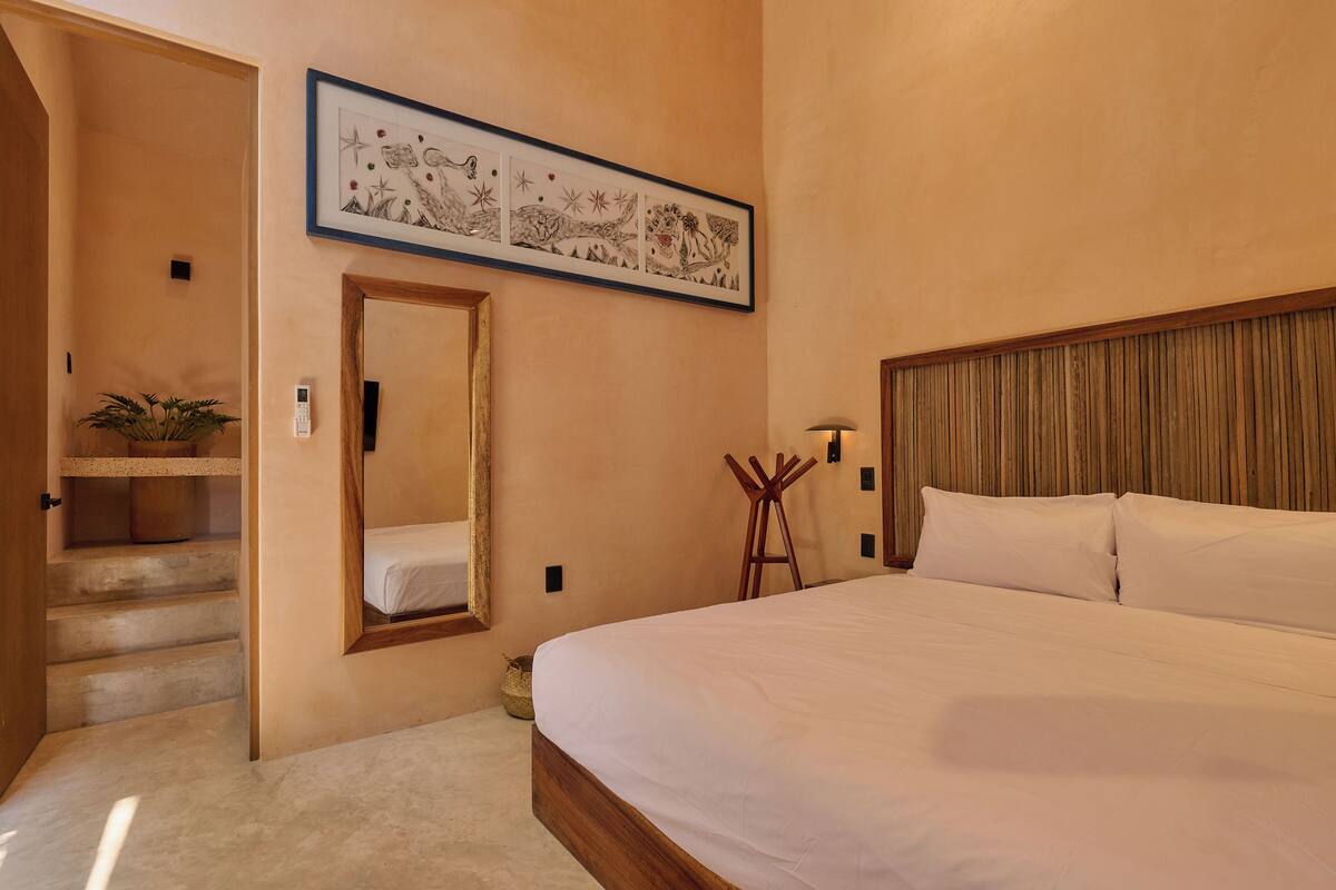 Deluxe Suite, 1 King Bed, Pool View | Minibar, in-room safe, iron/ironing board, free WiFi