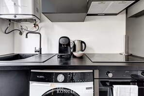 Fridge, microwave, stovetop, coffee/tea maker