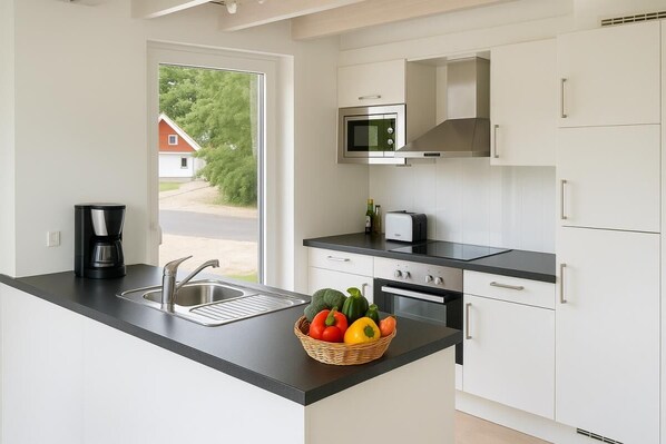 Fridge, oven, dishwasher, coffee/tea maker