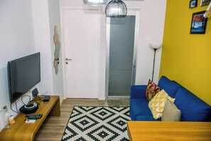 Living room - Cozy And Comfort 1Br With Walk In Closet At Pakubuwono Terrace Apartment (Jakarta)
