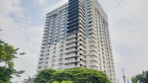 A high-rise building with multiple balconies and a modern architectural design. - Great Choice 2Br At Bintaro Icon Apartment (South Tangerang)