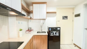 Standard Apartment | Private kitchen - Simply Look And Comfy 2Br Apartment M-Town Residence (Gading Serpong)