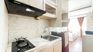 Standard Studio | Private kitchen - Minimalist And Homey Studio Apartment Amethyst (Jakarta)