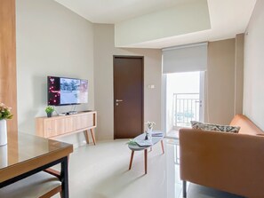 Standard Apartment | Living room - Minimalist 1Br Apartment At Mustika Golf Residence (Cikarang)
