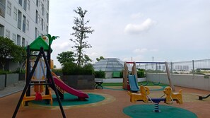 Children’s play area – outdoor - Cozy Living Studio Room At Serpong Garden Apartment (Cisauk)