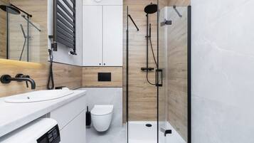 Shower, hair dryer, towels, shampoo