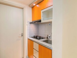 Standard Apartment | Private kitchen - Comfort And Tidy 2Br With Extra Room Apartment Meikarta (Cikarang)