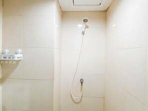 Standard Apartment | Bathroom - Simple Studio (No Kitchen) Near President University At Elvis Tower Apartment (Cikarang)