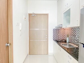 Standard Apartment | Private kitchen - Urban Modern Studio Apartment Oasis Cikarang (Cikarang)