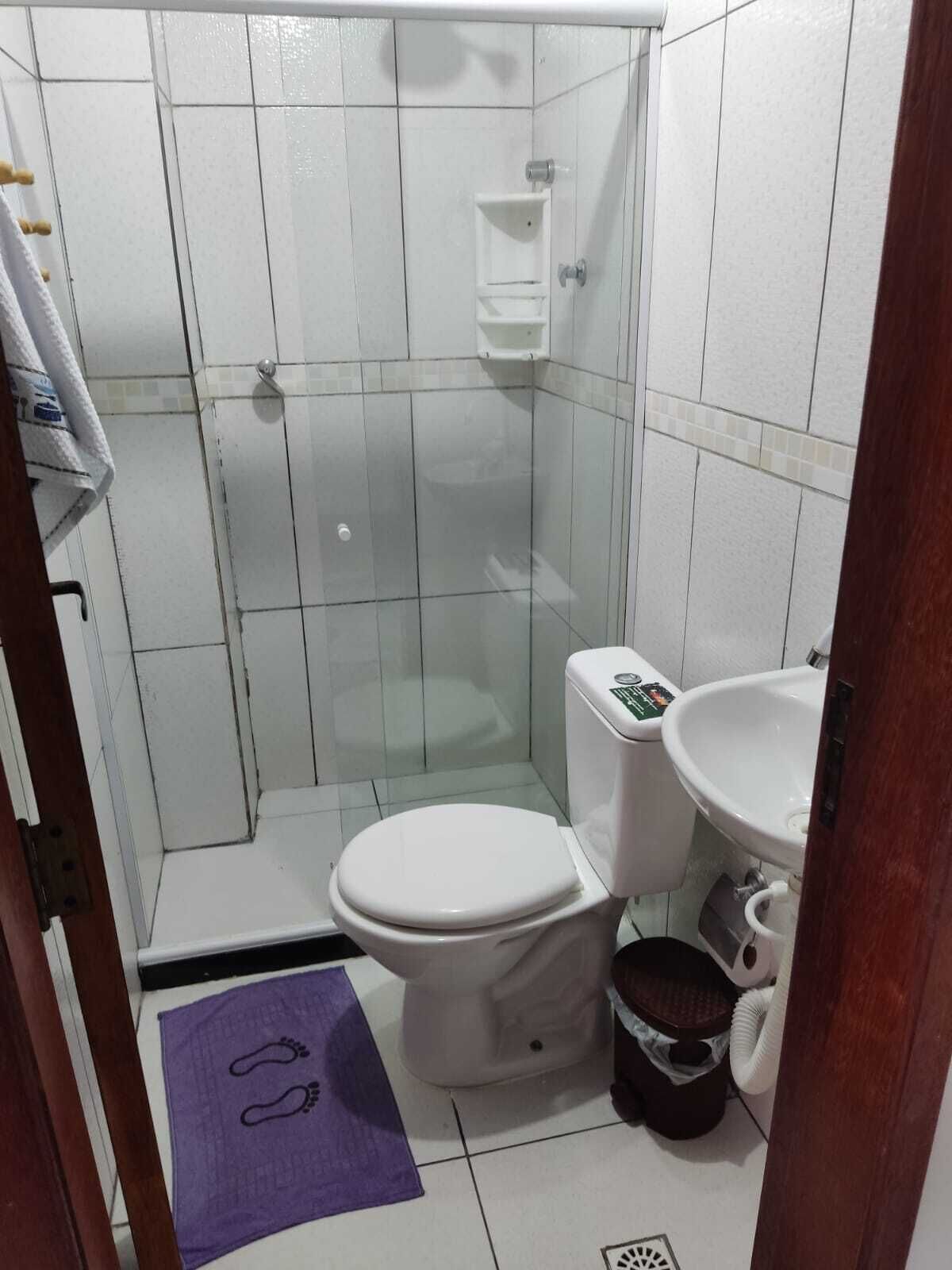 Shower, towels, toilet paper