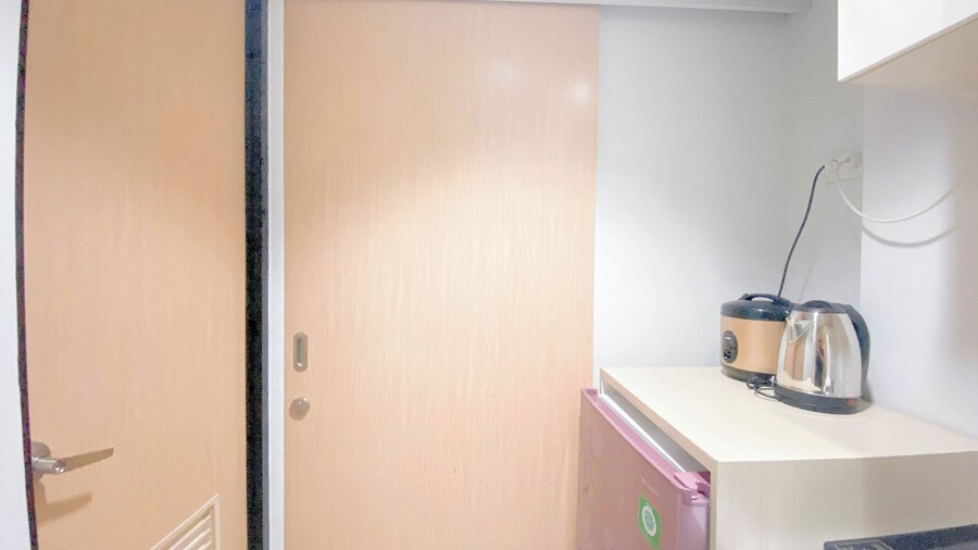 Simple White Studio Apartment At The Alton Semarang