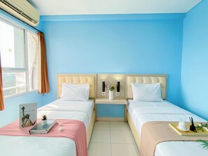 Standard Apartment | Bed sheets - Blue Accent Studio (No Kitchen) At Elvis Tower Apartment (Cikarang)