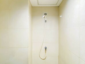 Standard Apartment | Bathroom - Blue Accent Studio (No Kitchen) At Elvis Tower Apartment (Cikarang)