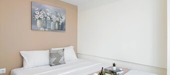 Modern 2Br At Meikarta Apartment Near Aeon Delta Mas