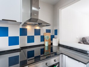 Fridge, dishwasher, cookware/dishes/utensils, dining tables