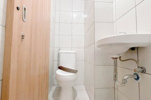 Standard Apartment | Bathroom - Neat Studio (No Kitchen) At Bandaraya - Tallasa City Makassar Apartment (Makassar)