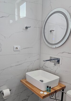 Fer et planche à repasser