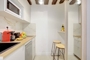 Fridge, microwave, coffee/tea maker, toaster