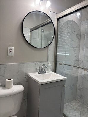 Shower, hair dryer, towels, soap