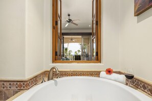 Shower, jetted tub, hair dryer, towels