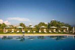 Seasonal outdoor pool, sun loungers