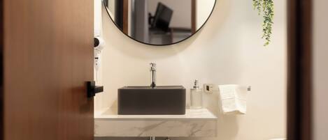 Hair dryer, towels, soap, toilet paper