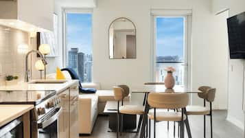 Luxury Apartment | Living area | 55-inch LED TV with digital channels