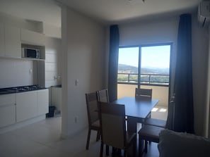 Departamento Deluxe, vista al mar | Comedor
