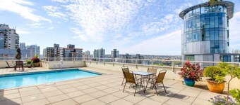 English Bay Views - Cozy Davie Village apartment with rooftop pool deck!