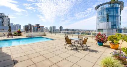 English Bay Views - Cozy Davie Village apartment with rooftop pool deck!