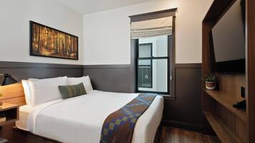 Premium bedding, blackout drapes, free WiFi, bed sheets