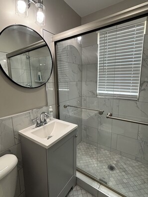 Hair dryer, towels, soap, toilet paper