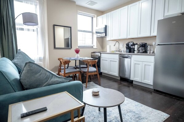 Living room - Stylish 3BR 2BA Steps From Central Park With Laundry (New York)