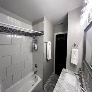 Hair dryer, towels, soap, shampoo
