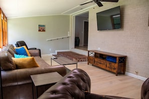 Smart TV, fireplace, DVD player, books