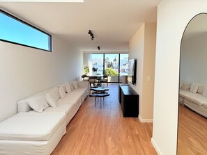 Premium Apartment, 3 Bedrooms, City View | Living area | 43-inch Smart TV with cable channels, Netflix, pay films