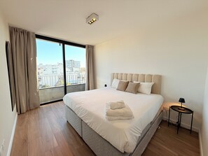 Premium Apartment, 3 Bedrooms, City View | Minibar, desk, laptop workspace, blackout curtains