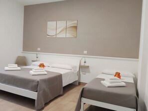 Premium bedding, memory-foam beds, individually furnished, desk