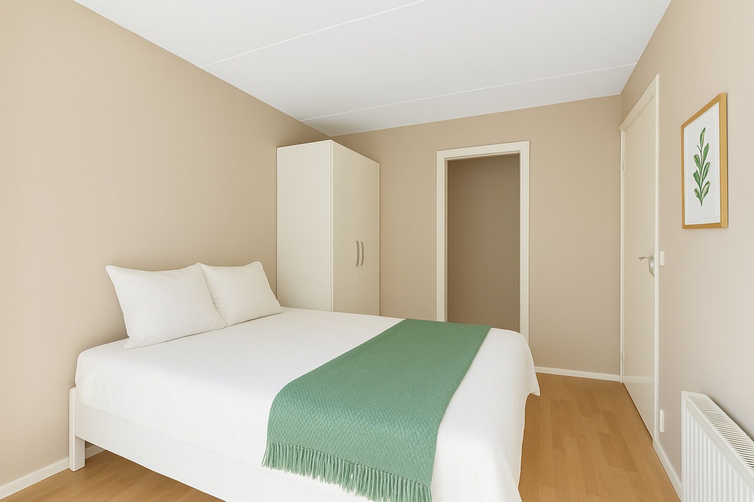 A bedroom with a bed, a wardrobe, a door, and a radiator.
