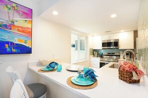 Fridge, microwave, oven, stovetop - 4 Unit Beach Condo Building with dock, sleeps 24 (Indian Rocks Beach)