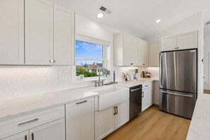 Fridge, microwave, oven, stovetop - 1726 - Beach Sea Sun, a 6-BR, 5.5-BA home in Corolla, perfect for up to 14 guests. (Corolla)