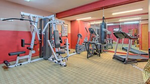 A gym with various exercise equipment, a punching bag, and a treadmill. - 1-Bedroom Condo w/ Fireplace in Sugar Mountain (Sugar Mountain)