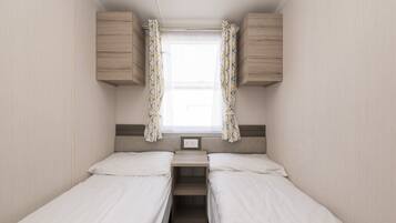 2 habitaciones y ropa de cama