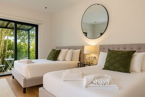 Premium bedding, down duvets, individually decorated